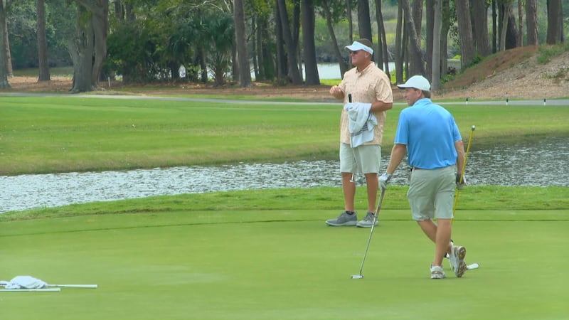 Golfers enjoy the green at Dunes Beach and Golf Club