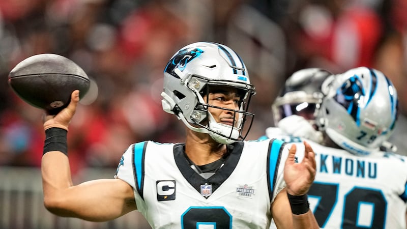 Carolina Panthers quarterback Bryce Young (9) throws in the pocket against the Atlanta Falcons...