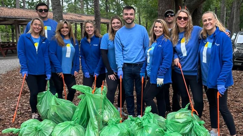 Volunteers got to work Monday morning picking up trash at Withers Swash Park.