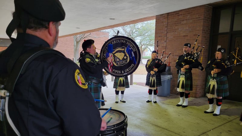 The service band practices for the graduation ceremony at the Myrtle Beach Police Department.