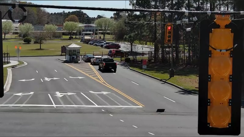 A long demanded traffic light is now up at one Horry County school intersection, but some...