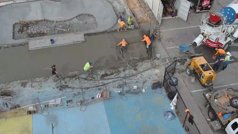 Crews work on a new skate bowl at the Matt Hughes Skate Park in Myrtle Beach that will create...