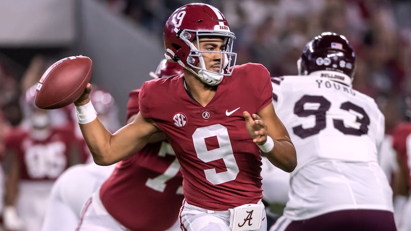 Alabama quarterback Bryce Young (9) throws the ball during the first half of the team's NCAA...