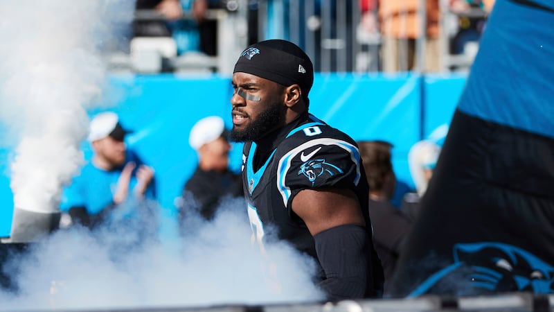 Carolina Panthers linebacker Brian Burns (0) takes the field prior to an NFL football game...