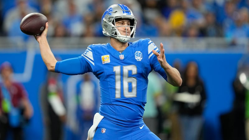 Detroit Lions quarterback Jared Goff (16) passes in the first half of an NFL football game...