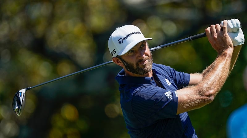 Dustin Johnson hits his tee shot on the fifth hole during the final round of the Tour...