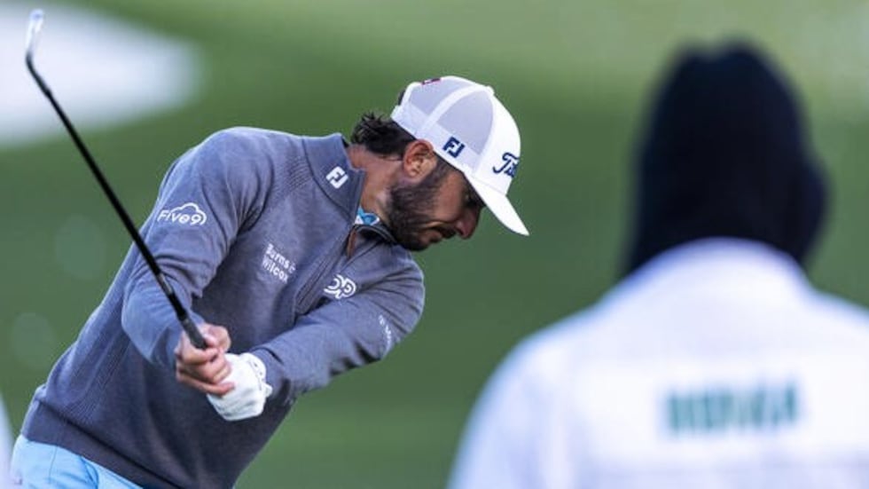 Max Homa of the United States warms up on the Tournament Practice Area during the continuation...