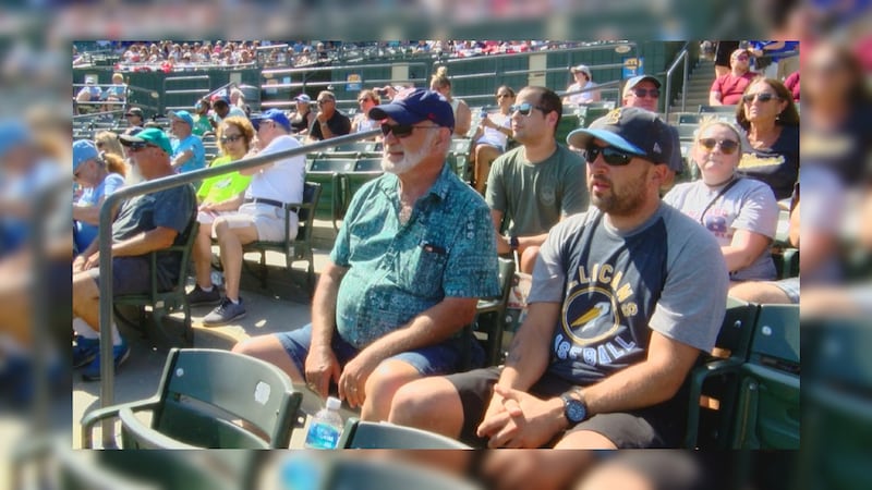 Air Force Cpt. Ben Boyle (right) with his father, Dan (left), attended Saturday night's game...