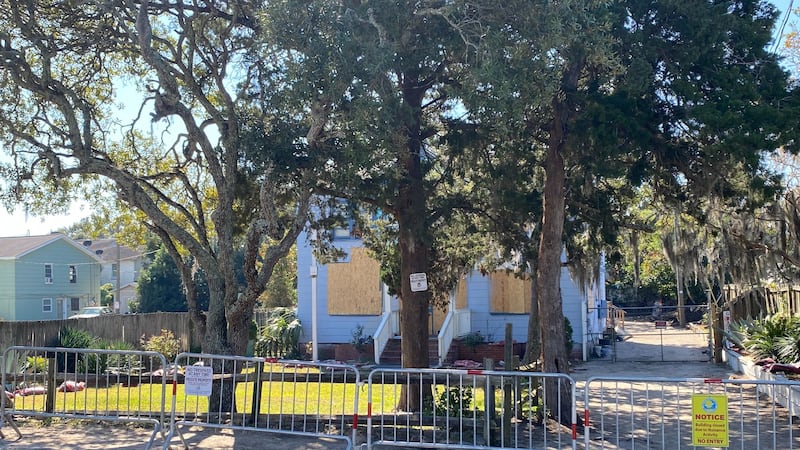 Myrtle Beach police put up barricades and boarded up the windows at the Yellow House along 5th...