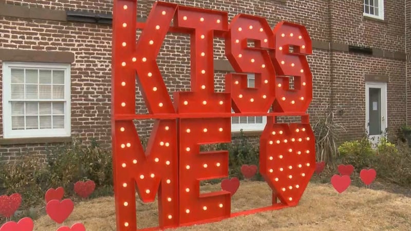A 'Kiss Me' sign in downtown Conway as staff decorate the city ahead of Valentine's Day.